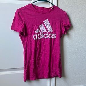Adidas “go to tee” in pink. Logo design in white and purple